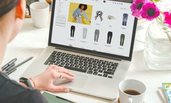 cabi stylist on a laptop working